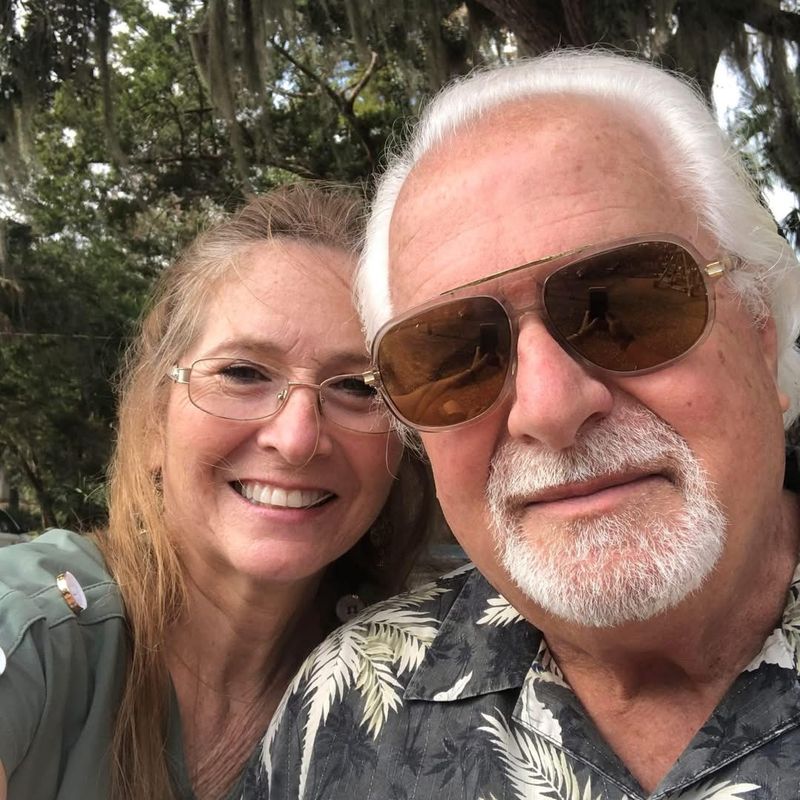 Mark Helmintoller with his wife outdoors — a real family, offering personal help with final expense insurance questions.